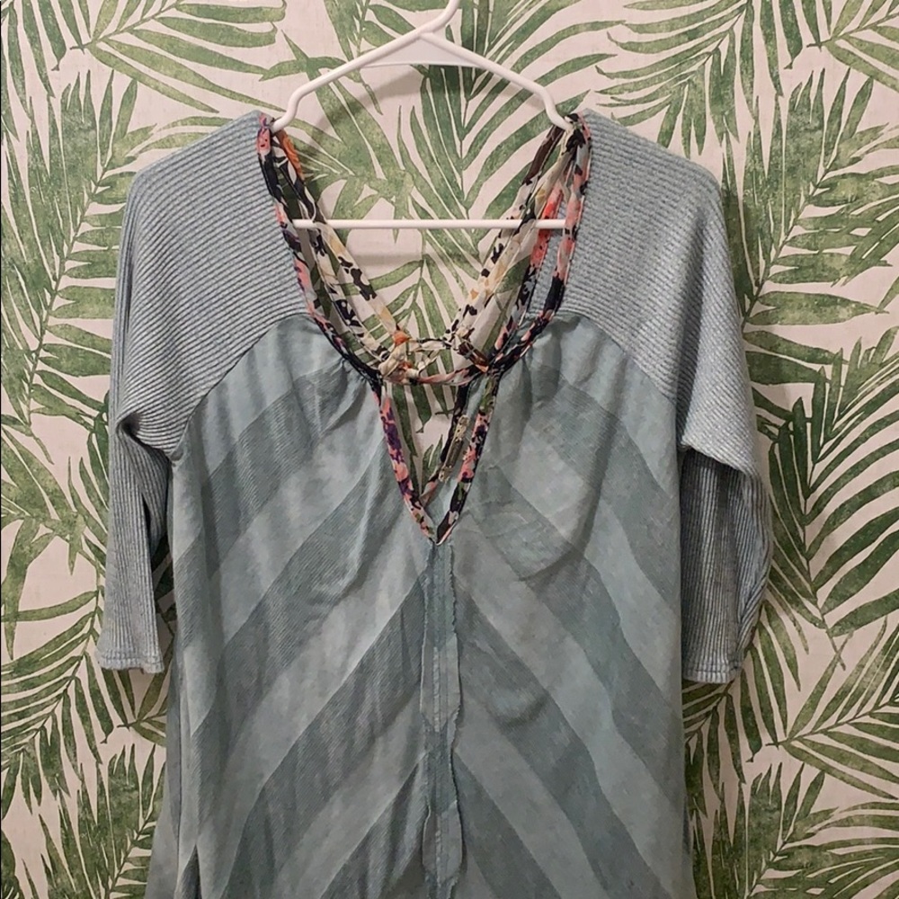 Strappy light blue sweater